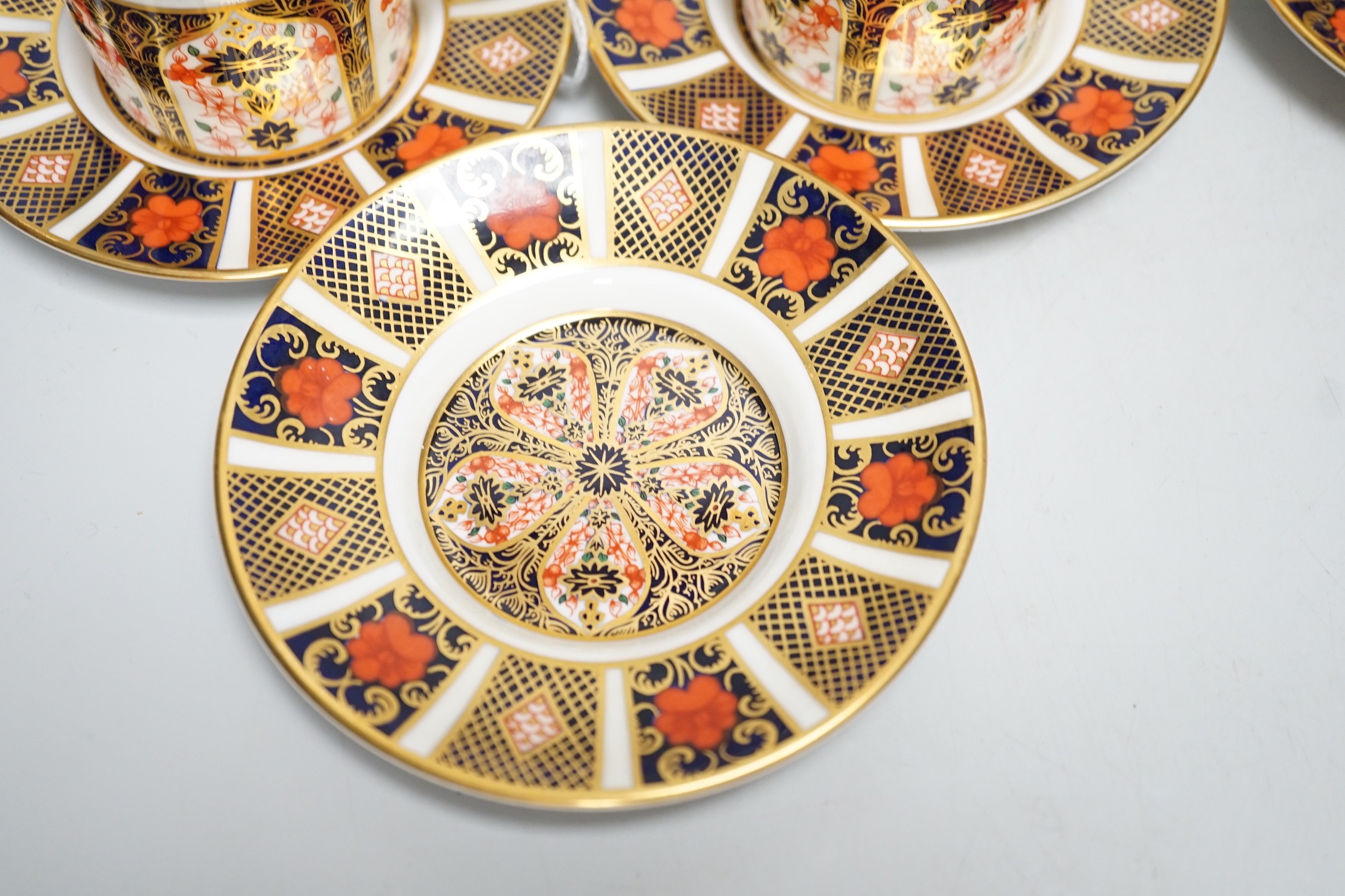 Six Royal Crown Derby coffee cans and saucers and a Royal Albert Country Roses dish and cover